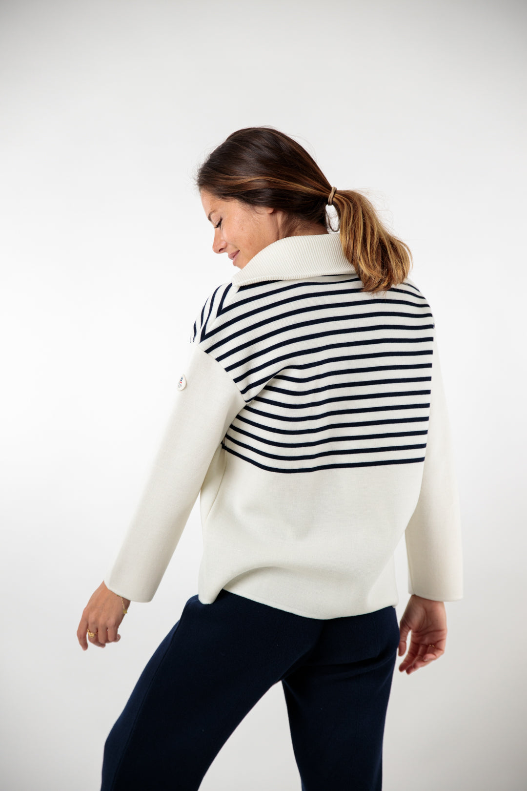 Two-tone striped sweater with peacock collar