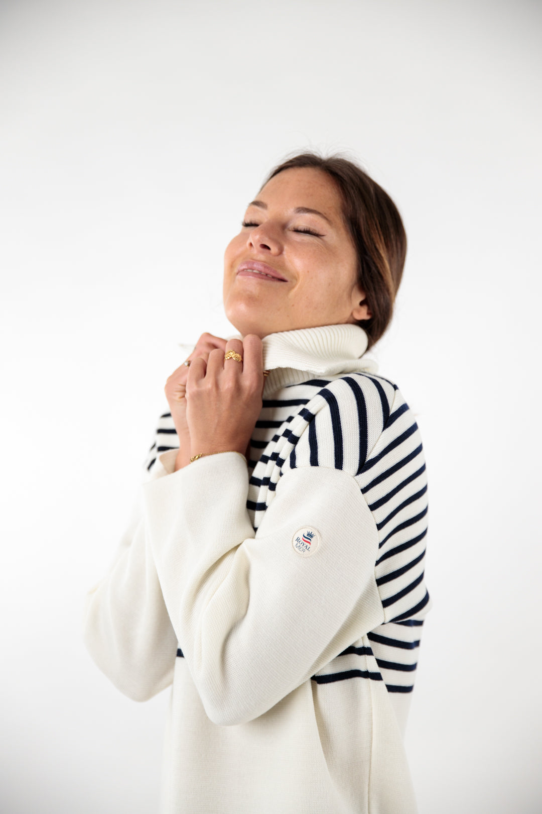 Two-tone striped sweater with peacock collar